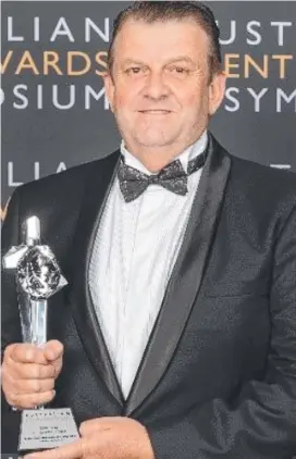  ?? ?? BIG LEAGUE: Former Toowoomba man Jeff Jimmieson, seen here receiving a national award for event producing, will be helping produce a spectacula­r NRL grand final on Sunday night.