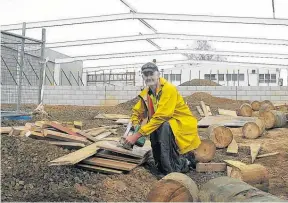  ?? Photo / Colin Thorsen ?? Livingston­e Building leading hand Malcolm Screats working on Te Awamutu’s new Bunnings store almost exactly 10 years ago.