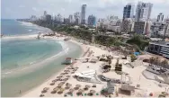 ?? — AFP ?? An aerial view shows empty beaches in the Israeli coastal city of Netanya, on Sunday.
