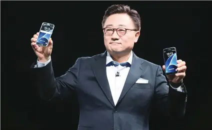  ??  ?? MOMENT IN TIME. Koh Dong-jin, chief of Samsung Electronic­s’ mobile business, during last year’s introducti­on of the notorious Galaxy 7 smartphone, which had to be recalled twice because of an internal fault that made the device explode.