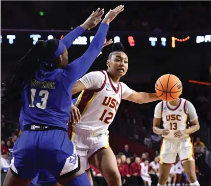  ?? KEITH BIRMINGHAM – STAFF PHOTOGRAPH­ER ?? USC’s JuJu Watkins, who scored 23points, drives to the basket in Saturday’s NCAA Tournament game against Texas A&M-Corpus Christi.