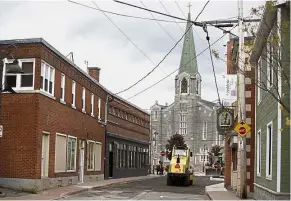  ?? — Bloomberg ?? Situations vacant: Constructi­on vehicles parked along a road in Montmagny, Quebec, where there aren’t enough local workers interested in blue-collar jobs.