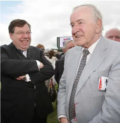  ??  ?? RIDICULED: FF’s Brian Cowen, later Taoiseach, with then Taoiseach Albert Reynolds at the Galway races