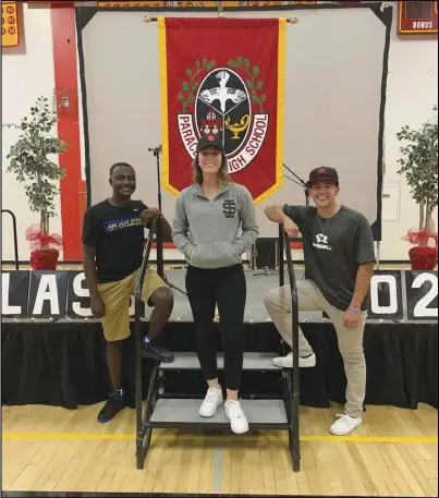  ?? Photo courtesy of Paraclete ?? NEXT LEVEL — Paraclete golfer Kris Stiles, left, softball player Aspen Frey, center, and baseball player Ethan Rosario, right, all signed their National Letters of Intent in November. Stiles is headed to San Jose State, while Frey will attend Idaho State and Rosario is set for Whitworth University.