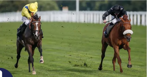  ?? ALAN CROWHURST/GETTY IMAGES) ?? Reverend Jacobs (left), with Ryan Moore up, gets the better of Hang Man to win The Garden For All Seasons Maiden Stakes at Ascot