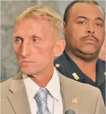  ?? STAFF PHOTO BY CHRIS CHRISTO ?? CAUGHT: Boston police Commission­er William B. Evans, left, pictured with Superinten­dent-in-Chief William G. Gross, announced the arrest of rape suspect Eduardo Rodriguez yesterday.