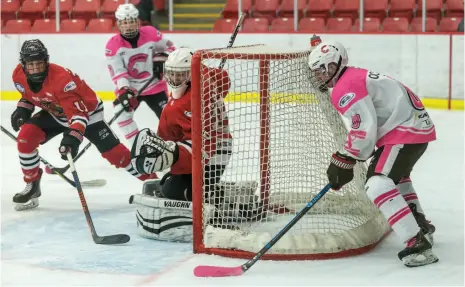  ?? CITIZEN PHOTO BY JAMES DOYLE ?? Cariboo Cougars forward Alex Ochitwa tries a wraparound against the Vancouver Northwest Hawks on Saturday afternoon at Kin 1. In their Pink in the Rink game – which raised funds and awareness in the fight against breast cancer – the Cougars won 4-2 and raised $2,200 for the cause.