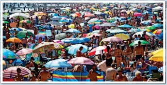  ??  ?? JAM-PACKED: Bournemout­h beach last summer when travelling abroad was difficult