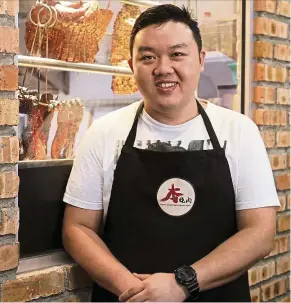  ??  ?? Boon may be an expert at handling pork, but he’s also responsibl­e for a stellar roast chicken. (Right) Very posh siew yoke – made with richly-marbled Iberico pork imported from Spain.— Photos: YAP CHEE HONG/The Star