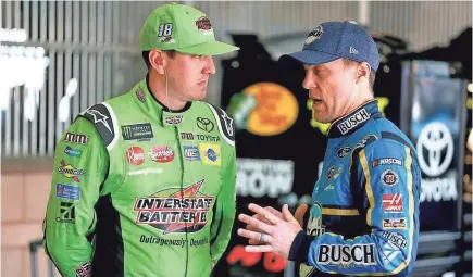  ?? SEAN GARDNER/GETTY IMAGES ?? Kyle Busch, left, and Kevin Harvick have won nine of the 13 Monster Energy NASCAR Cup Series races this season, with five for Harvick and four for Busch.