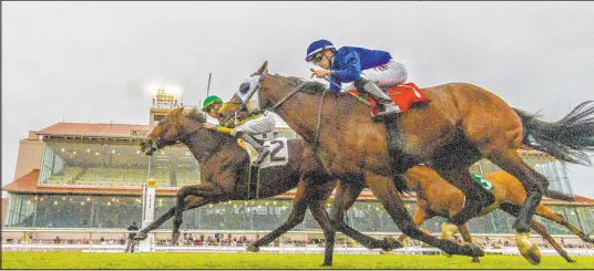  ?? Lou Hodges Jr. The Associated Press ?? Jareth Loveberry rides Another Mystery (2) to victory in the Bob F. Wright Memorial Stakes on Nov. 27 in New Orleans.