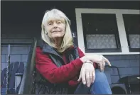  ?? (AP/Gillian Flaccus) ?? Crowley sits outside her home in Hood River, Ore.