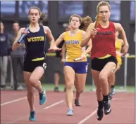  ?? H John Voorhees III / Hearst Connecticu­t Media ?? SWC girls indoor track championsh­ip action at Floyd Little Athletic Center in New Haven in 2018.
