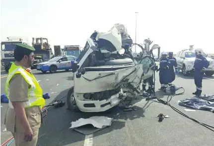  ?? Courtesy Dubai Police ?? Seven people in this minibus were killed when it crashed into a stationary lorry in the middle of Emirates Road in Dubai.