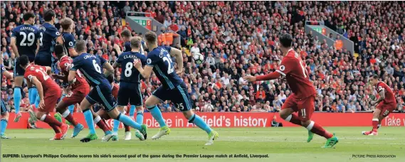  ?? PICTURE: PRESS ASSOCIATIO­N ?? SUPERB: Liverpool’s Philippe Coutinho scores his side’s second goal of the game during the Premier League match at Anfield, Liverpool.