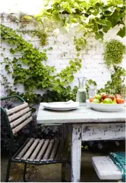  ??  ?? dining room from the kitchen’s working area; in previous centuries, the rear outside space was a working yard, but it’s now a paved seating area