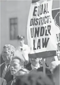  ??  ?? Former Republican governor of California Arnold Schwarzene­gger waits outside the Supreme Court during arguments over a redistrict­ing case involving Wisconsin last year. JACK GRUBER/USA TODAY