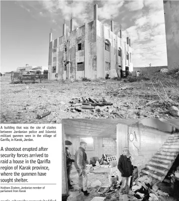  ??  ?? A building that was the site of clashes between Jordanian police and Islamist militant gunmen seen in the village of Garifla, in Karak, Jordan. People walk inside a building. — Reuters photos