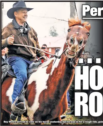  ??  ?? Roy Moore arrived to vote on his horse yesterday, but he was in for a rough ride, going down to defeat in the Alabama special election for Senate.