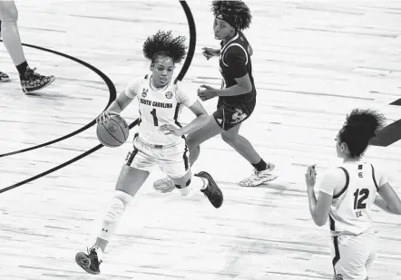  ?? Eric Gay / Associated Press ?? South Carolina guard Zia Cooke, who scored 17 points, dribbles in the second half of a Sweet 16 victory over Georgia Tech on Sunday.