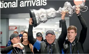  ?? PHOTO: GETTY IMAGES ?? Team NZ skipper Glenn Ashby, left, Grant Dalton and Peter Burling in Auckland yesterday.