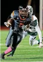  ?? [PHOTO
BY CORY YOUNG/FOR TULSA
WORLD] ?? Booker T. Washington running back Rylan McQuarters runs for a big gain and touchdown. McQuarters is No. 30 on The Oklahoman’s Super 30 recruit rankings for the class of 2018.