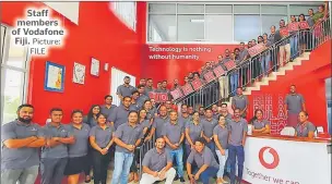  ?? Picture: FILE ?? Staff members of Vodafone Fiji.