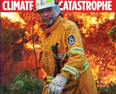  ??  ?? OUT OF CONTROL:
A firefighte­r at the scene of a devastatin­g bushfire in New South Wales last year