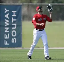  ?? CHRISTOPHE­R EVANS / HERALD STAFF FILE ?? SOUTH PARK: J.D. Martinez of the Boston Red Sox catches a fly ball during a spring training workout last year.