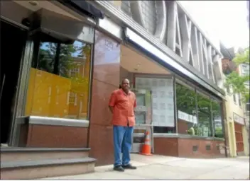  ?? Trentonian PHOTO/JOEY KULKIN ?? Trenton native Olugbala Sababu is opening The Big Easy restaurant in the old Maxine’s building at 120 S. Warren St. It is scheduled to open June 21.