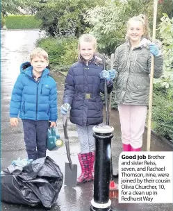  ??  ?? Good job Brother and sister Reiss, seven, and Rachael Thomson, nine, were joined by their cousin Olivia Churcher, 10, for a clean up in Redhurst Way Councillor Stephen Burns Paisley South West