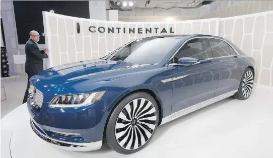  ?? MA R K L E N N I H A N / T H E A S S O C I AT E D P R E S S ?? A Lincoln Continenta­l concept car is shown at the New York Internatio­nal Auto Show on Monday. The production version of the car goes on sale in 2016.