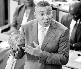  ?? ANTOINE LODGE/PHOTOGRAPH­ER ?? Prime Minister Andrew Holness delivering his speech for the 2024-2025 Budget Debate in George William Gordon House on Thursday.