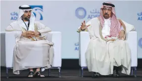  ?? Victor Besa / The National ?? Suhail Al Mazrouei, Minister of Energy, left and his Saudi counterpar­t Khalid Al Falih at the Adipec panel