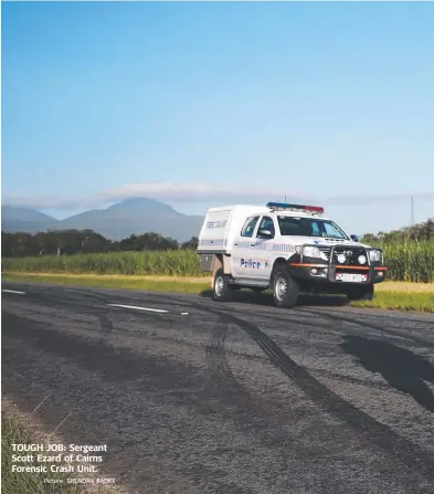  ?? Picture: BRENDAN RADKE ?? TOUGH JOB: Sergeant Scott Ezard of Cairns Forensic Crash Unit.