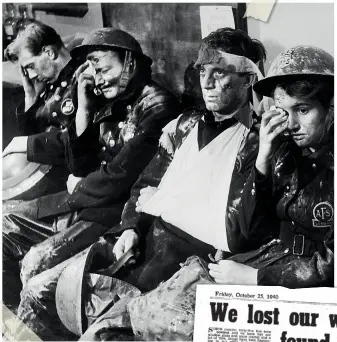  ??  ?? Auxiliary Fire Service workers, injured fighting blazes after an air raid, are waiting to be seen at a casualty clearing station in Westminste­r Hospital, London. October 1940