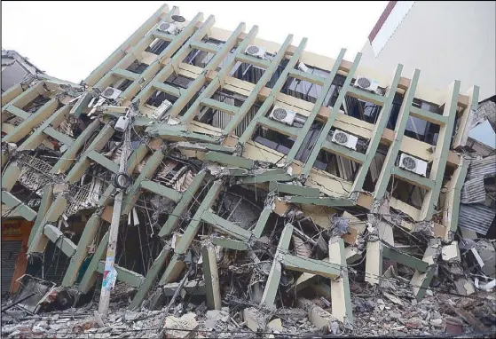  ?? AFP ?? Photo shows a toppled building after a 7.8-magnitude quake hit Ecuador on Saturday.