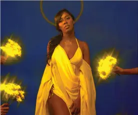  ??  ?? ‘I want to make vibes that evoke some fire’ … Tiwa Savage Photograph: TSE/Lakin