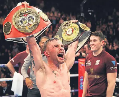  ?? Picture: Getty. ?? Carl Frampton celebrates his win over Scott Quigg. Now he faces Mexican-American WBA featherwei­ght title holder Leo Santa Cruz at the Barclays Centre in New York.