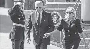  ?? ANDREW HARNIK/AP ?? President Joe Biden and first lady Jill Biden arrive on the South Lawn of the White House on Monday to take part in Memorial Day events.