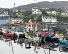  ??  ?? TIED UP
Fishing boats in Tarbert, Argyll