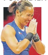  ?? AP/LUCA BRUNO ?? HIDILYN diaz gestures after winning the gold medal in the women’s 55-kg weightlift­ing event, at the 2020 summer Olympics, Monday, July 26, 2021, in Tokyo, Japan.