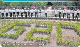  ?? AFP ?? G20 leaders during a tree planting event at a mangrove forest on the sidelines of the G20 summit in Bali on Wednesday.