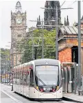  ??  ?? An Edinburgh tram.