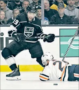  ?? Wally Skalij Los Angeles Times ?? ALEX IAFALLO goes for the puck against Edmonton’s Darnell Nurse in Game 4, the Kings’ first home playoff win since 2014 and a return to the team’s identity.