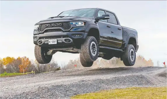  ?? RAM ?? By engaging Launch mode, the driver unleashes all of the Ram 1500 TRX's 702 horsepower and 650 pound-feet of torque through its 35-inch Goodyear Wrangler Territory tires.
