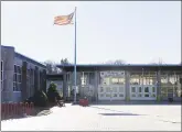  ?? Hearst Connecticu­t Media file photo ?? The entrance to Greenwich High School. A lawsuit has been filed over a student who was hit on the head by a fallen ceiling tile in Aptil 2018.