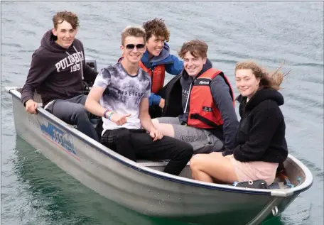  ??  ?? Amy Bates, Cathal Tevan, Padraig Cathal, Ciaran Cussen and Sean Byrne enjoying a bit of boating in Wicklow harbour.