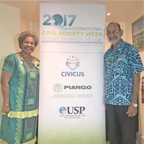  ?? Photo: Sheldon Chanel ?? PIANGO executive director Emele Duituturag­a (left) and USP Vice-chancellor Professor Rajesh Chandra during the launch of the Internatio­nal Civil Society Week logo on August 4, 2017.
