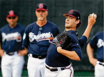  ?? CURTIS COMPTON / CCOMPTON@AJC.COM ?? Braves right-hander Ian Anderson, the No. 3 overall pick in the 2016 draft, is the club’s No. 1 pitching prospect, according to Baseball America. He was optioned to minor league camp Friday.